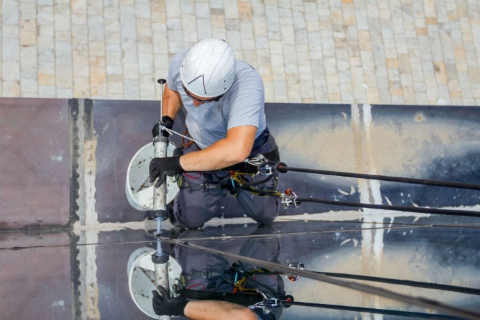 Sealing adhesive for construction